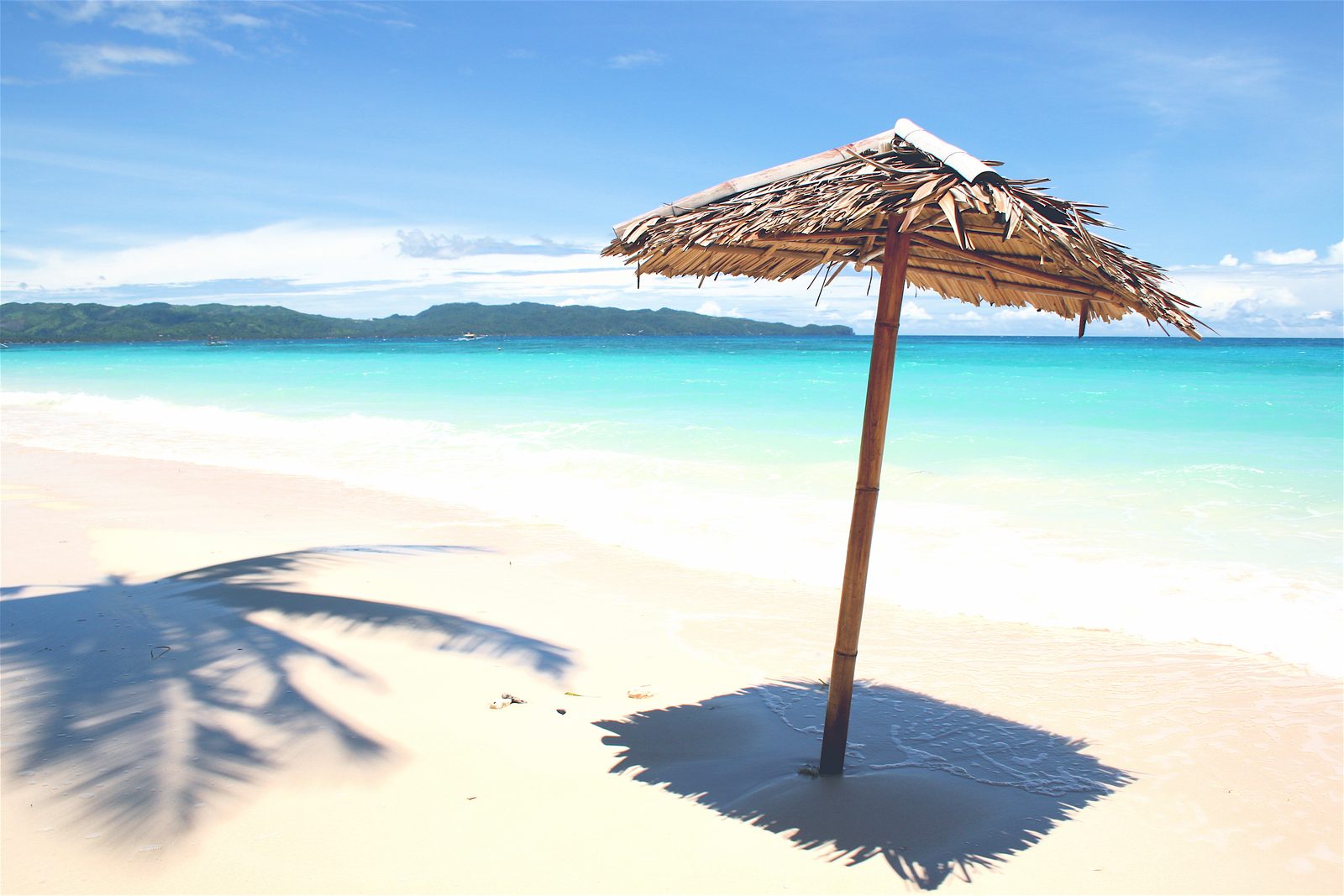 White sand beach with turquoise water in the Philippines